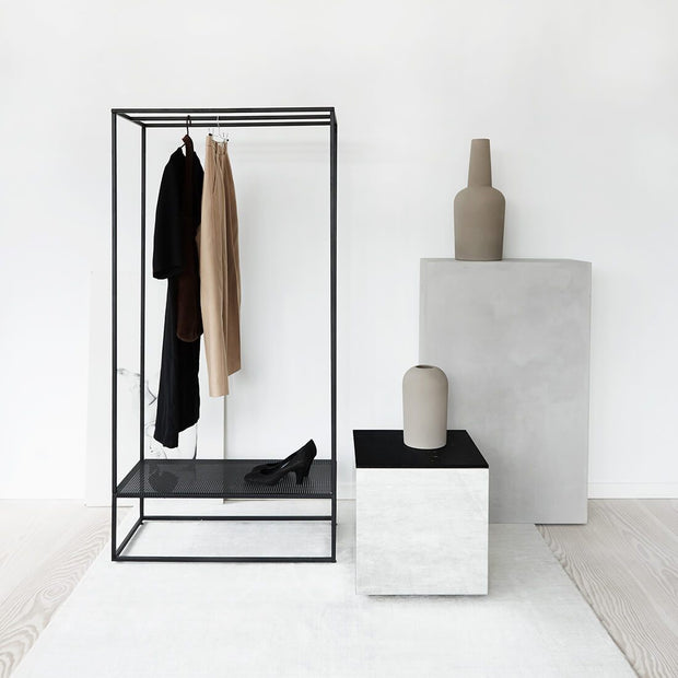 minimalistic black steel clothes rack kristina dam studio